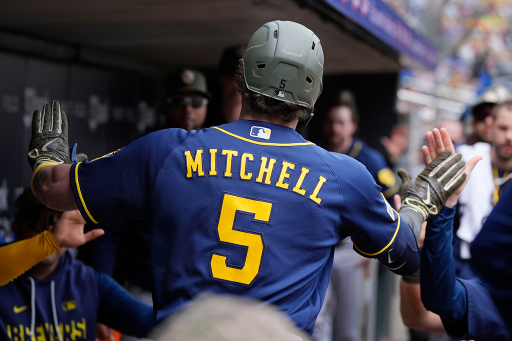 Milwaukee Brewers' Garrett Mitchell celebrates after his solo home run against the Minnesota Twins in the fourth inning of a baseball game Sunday, May 17, 2026, in Minneapolis. (AP Photo/Bruce Kluckhohn)
