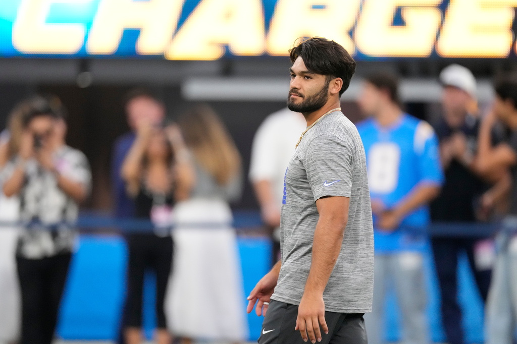 Los Angeles Rams wide receiver Puka Nacua looks on before a preseason NFL football game against the Los Angeles Chargers Thursday, Aug. 27, 2026, in Inglewood, Calif. (AP Photo/Mark J. Terrill)