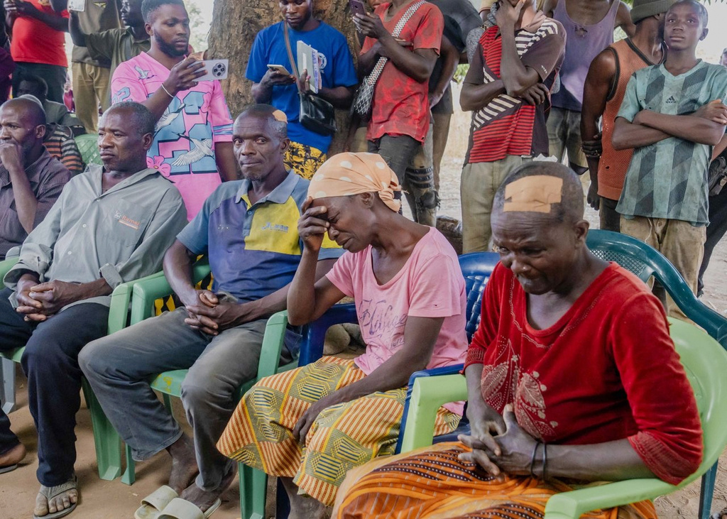 In this photo released by the Kaduna State government, people react during a meeting with Kaduna state Governor. Uba Sani, after gunmen attack in Kurmin Wali, northwest Nigeria, Wednesday, Jan. 21, 2026. (Kaduna State Government via AP)