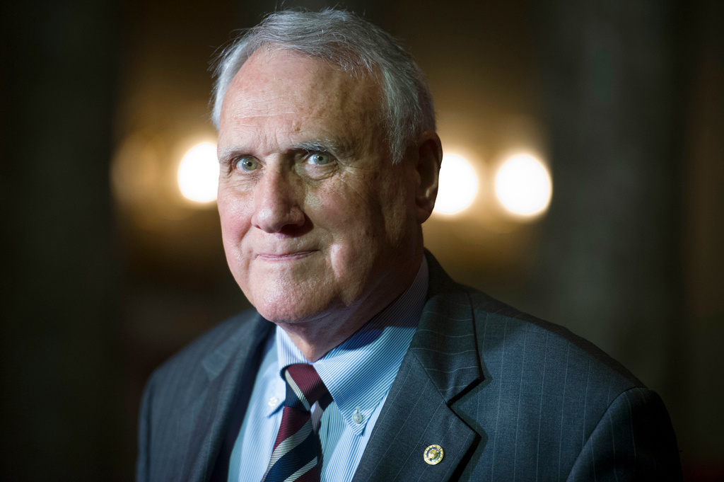 FILE - Sen. Jon Kyl, R-Ariz., waits to be sworn-in by Vice President Mike Pence during his ceremonial swearing-in at the Old Senate Chamber on Capitol Hill, in Washington, Sept. 5, 2018. (AP Photo/Cliff Owen, File)