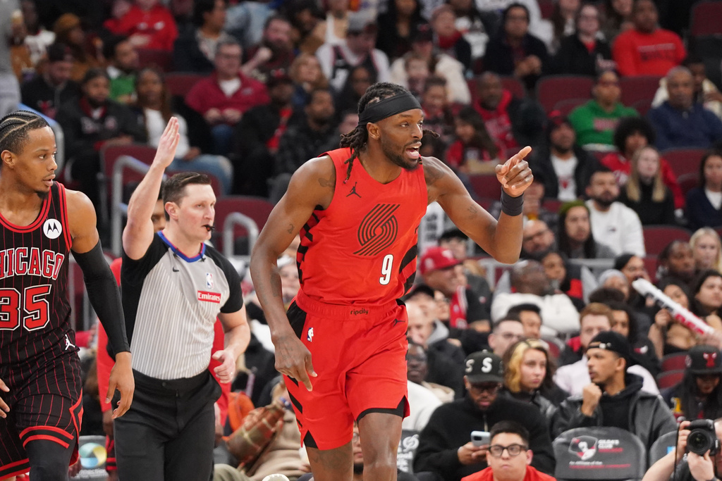 Portland Trail Blazers forward Jerami Grant (9) gestures after making a three point basket against the Chicago Bulls during the second half in an NBA basketball game Thursday, Feb. 26, 2026, in Chicago. (AP Photo/David Banks)