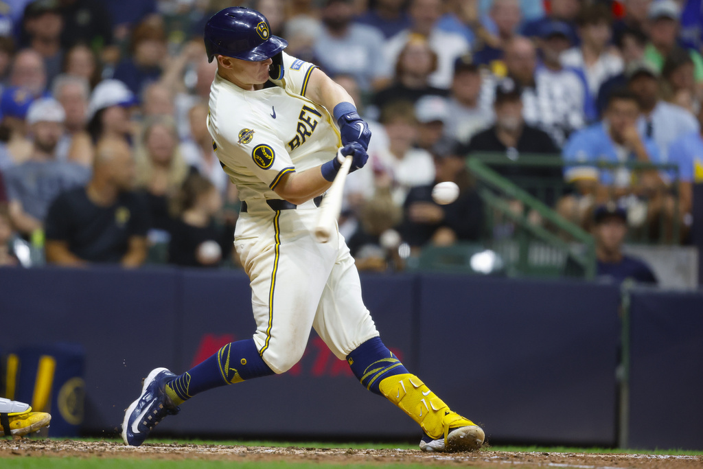 Milwaukee Brewers' Andrew Vaughn connects for a three-run home run against the Pittsburgh Pirates during the sixth inning of a baseball game, Tuesday, Aug.12, 2025, in Milwaukee. (AP Photo/Jeffrey Phelps)