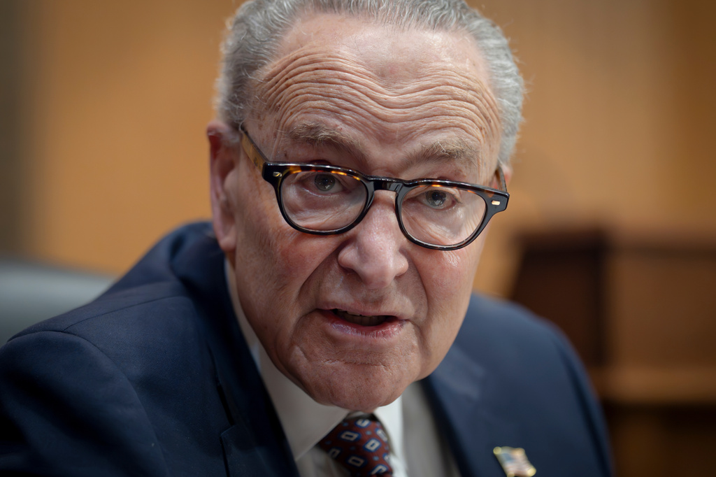 FILE - Senate Minority Leader Chuck Schumer, D-N.Y., speaks at a forum on climate change and the consequences for home insurance, grocery prices, and health care costs, at the Capitol in Washington, March 26, 2026. (AP Photo/J. Scott Applewhite, File)