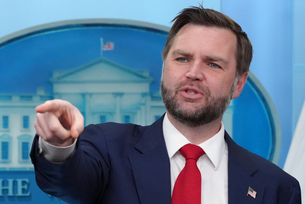 Vice President JD Vance points as he takes questions from reporters in the James Brady Press Briefing Room at the White House, Thursday, June 18, 2026, in Washington. (AP Photo/Jacquelyn Martin)
