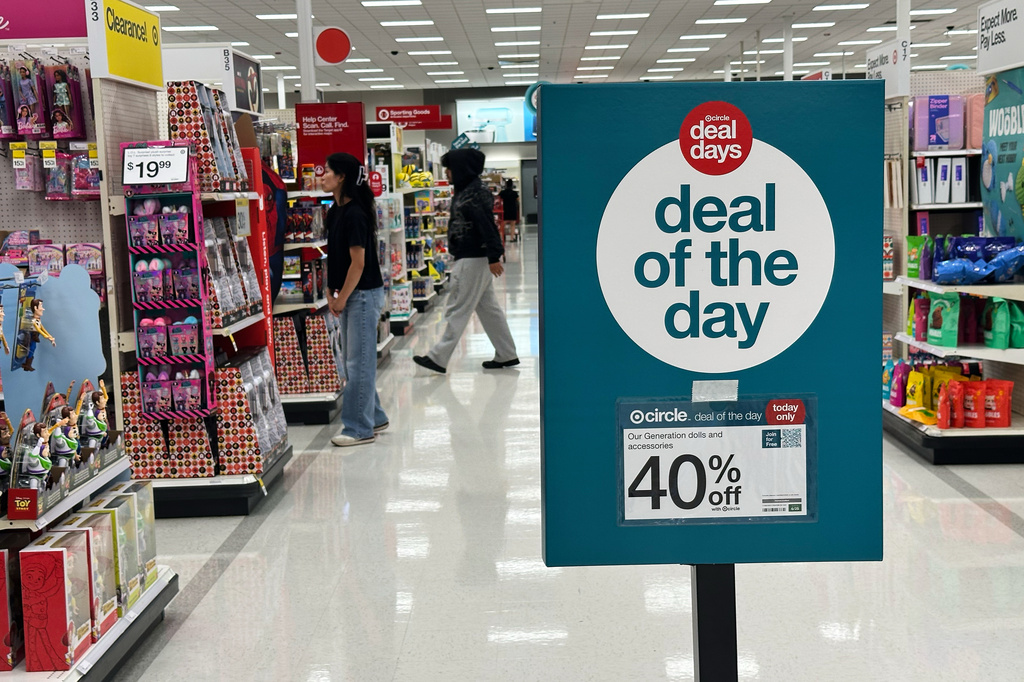 A sale information sign is displayed at a retail store in Wheeling, Ill., Thursday, June 25, 2026. (AP Photo/Nam Y. Huh)