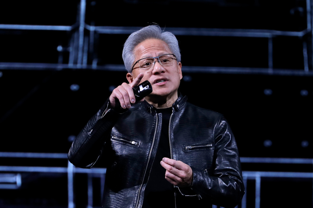 Nvidia CEO Jensen Huang delivers a speech during the Computex 2026 exhibition in Taipei, Taiwan, Monday, June 1, 2026. (AP Photo/Chiang Ying-ying)
