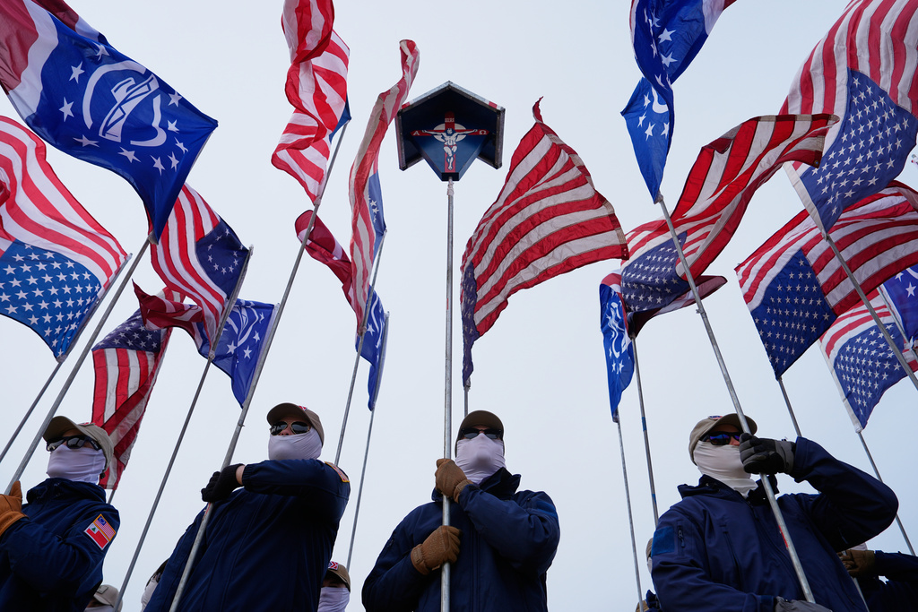Members of the Patriot Front hold flags on the National Mall during the annual March for Life, Friday, Jan. 23, 2026, in Washington. (AP Photo/Julia Demaree Nikhinson)
