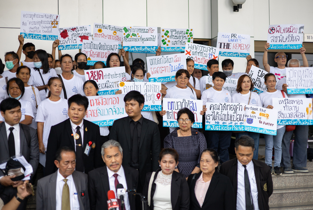 The legal team of Thai villagers suing an Australia-owned gold mine speak in front of the Bangkok Civil Court in Bangkok, Thailand, on Tuesday, March 24, 2026. (AP Photo/Anton L. Delgado)