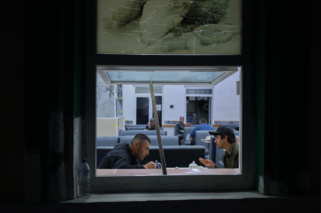 Diners eat at a restaurant in Khujand, Tajikistan, Saturday, May 2, 2026. (AP Photo/Jon Orbach)