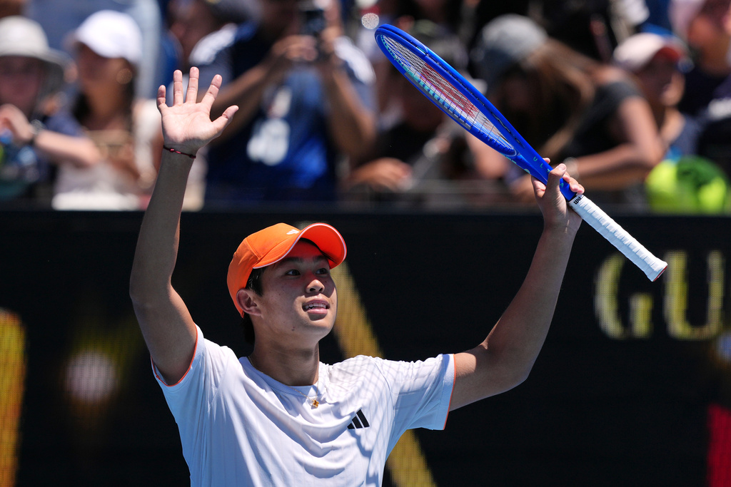 Learner Tien of the U.S. celebrates after defeating Nuno Borges of Portugal in their third round match at the Australian Open tennis championship in Melbourne, Australia, Friday, Jan. 23, 2026. (AP Photo/Dar Yasin)