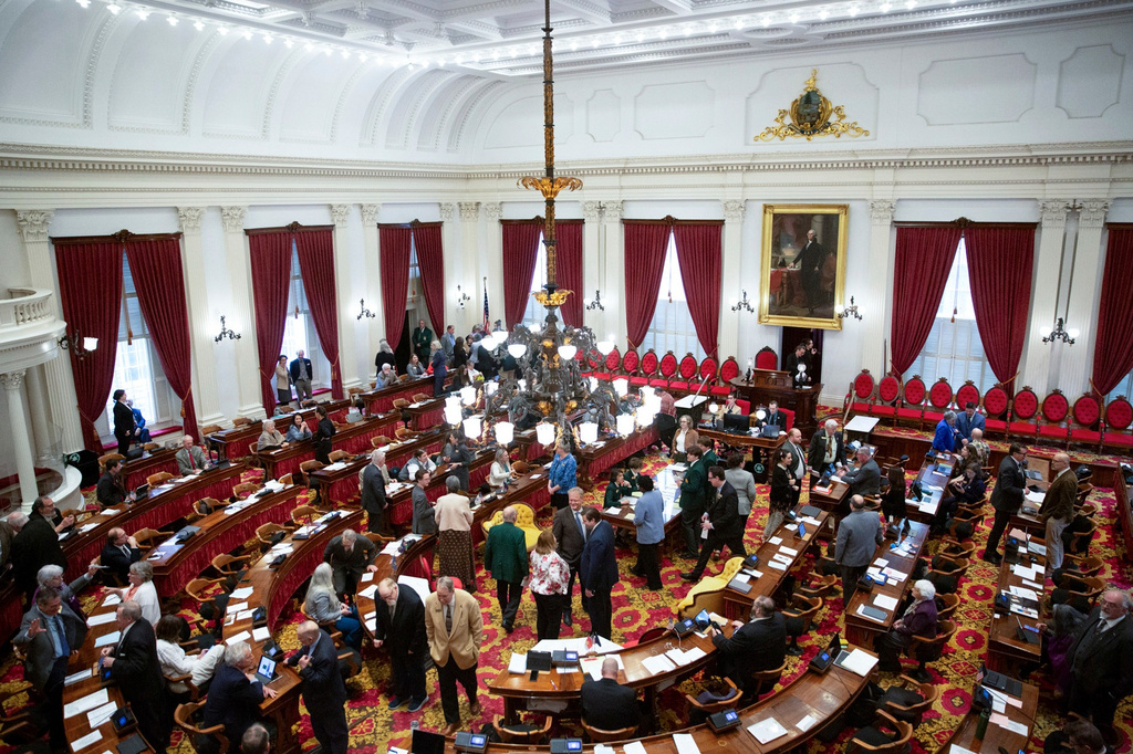 FILE - Vermont state legislators gather on the house floor at the Vermont state Capitol, May 8, 2025, in Montpelier, Vt. (AP Photo/Alex Driehaus, File)