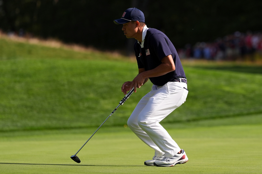United States' Collin Morikawa reacts after missing a putt on the 13th hole at Bethpage Black golf course during the Ryder Cup golf tournament, Saturday, Sept. 27, 2025, in Farmingdale, N.Y. (AP Photo/Lindsey Wasson)