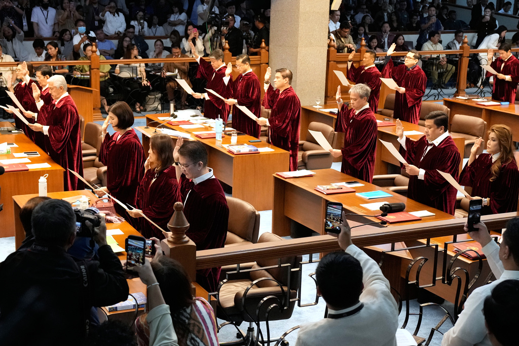 Philippine senators convene as an impeachment court for the trial of Vice President Sara Duterte at the Philippine senate, Monday, May 18, 2026, in Pasay, Philippines. (AP Photo/Aaron Favila)