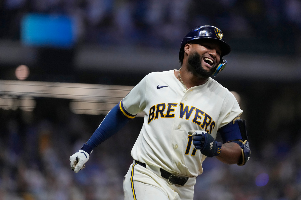 Milwaukee Brewers' Jackson Chourio smiles as he rounds the bases after hitting a two-run home during the ninth inning of a baseball game against the Chicago Cubs, Tuesday, Sept. 8, 2026, in Milwaukee. (AP Photo/Aaron Gash)
