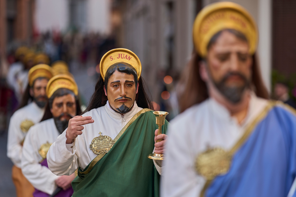 Penitents depicting the apostles march during a Holy Week procession of the "Hermandad de Nuestro Padre Jesus Nazareno" brothergood in Puente Genil, southern Spain, Friday, April 3, 2026. (AP Photo/Manu Fernandez)