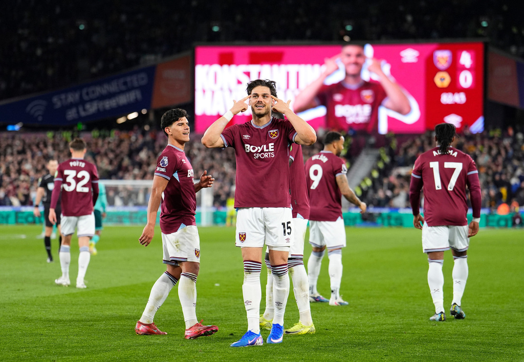 West Ham United's Konstantinos Mavropanos celebrates scoring their side's fourth goal of the game during their English Premier League soccer match against Wolverhampton Wanderers in London, Friday, April 10, 2026. (Jordan Pettitt/PA via AP)