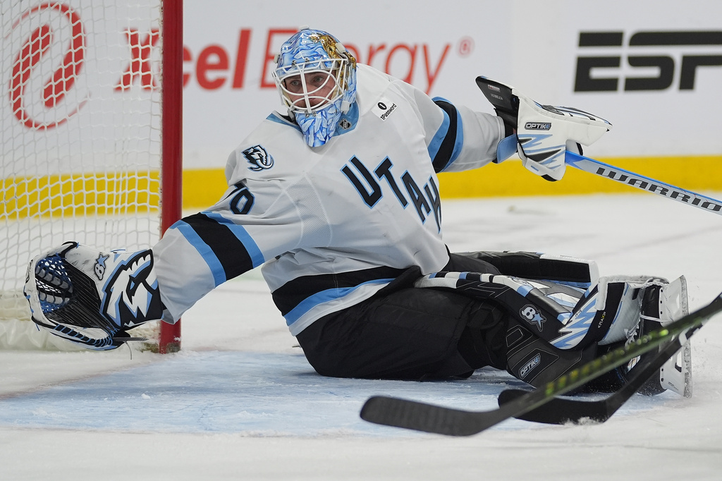 Utah Mammoth goaltender Karel Vejmelka (70) defends the goal during the first period of an NHL hockey game against the Minnesota Wild, Tuesday, March 10, 2026, in St. Paul, Minn. (AP Photo/Abbie Parr)
