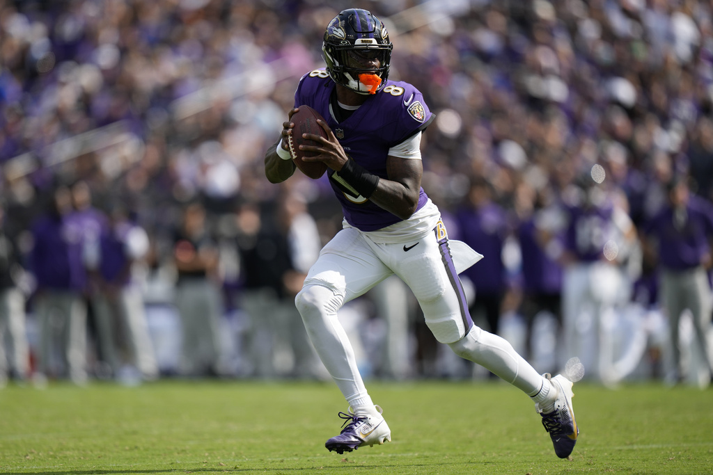Baltimore Ravens quarterback Lamar Jackson looks to pass against the Cleveland Browns during the second half of an NFL football game, Sunday, Sept. 14, 2025, in Baltimore. (AP Photo/Stephanie Scarbrough)