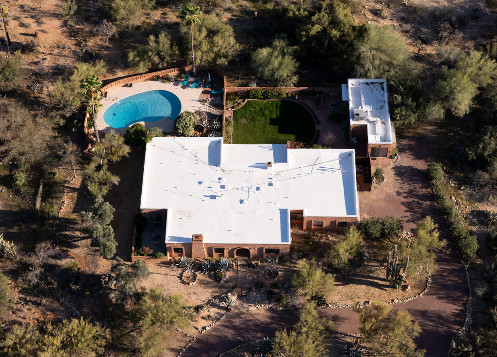 FILE - An aerial view of the home of Nancy Guthrie, the missing mother of "Today" show host Savannah Guthrie, in Tucson, Ariz., on Friday, March 6, 2026,. (AP Photo/Rebecca Noble,File)