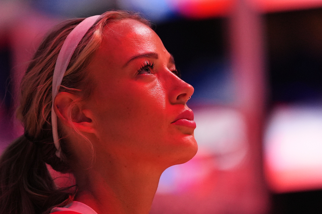 Indiana Fever guard Sophie Cunningham looks on during the national anthem before facing the Seattle Storm a WNBA basketball game, Tuesday, July 28, 2026, in Seattle. (AP Photo/Lindsey Wasson)