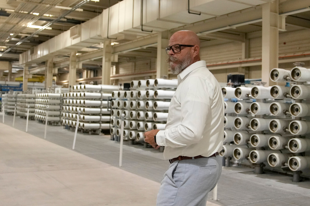 Bryan Cassens, Assistant Senior Director at the Scottsdale Water Campus, walks through the site, Wednesday, Sept. 9, 2026, in Scottsdale, Ariz. (AP Photo/Ross D. Franklin)