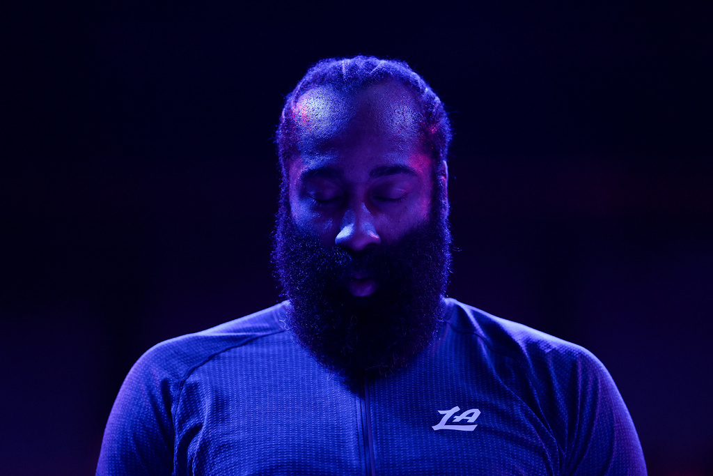 Los Angeles Clippers guard James Harden (1) stands during the national anthem before an NBA basketball game against the Minnesota Timberwolves Saturday, Dec. 6, 2025, in Minneapolis. (AP Photo/Matt Krohn)