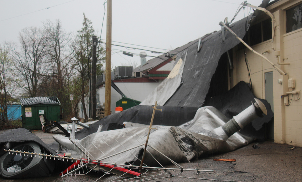 Storm damage is seen around Ann Arbor, Mich., on Wednesday, April 15. 2026. ( Jordyn Pair /Ann Arbor News via AP)