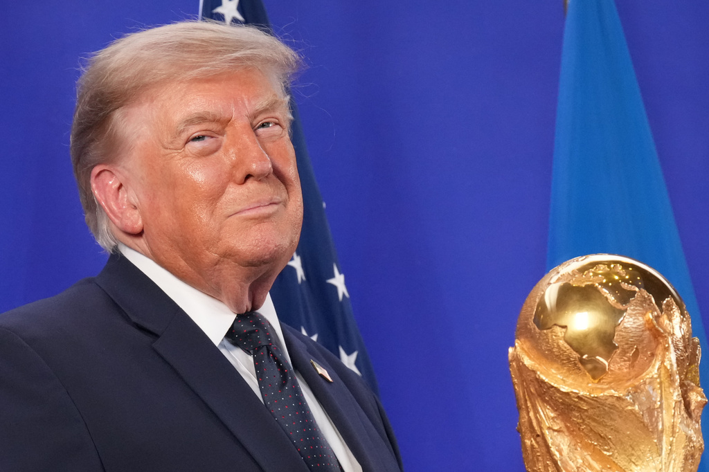 President Donald Trump listens as FIFA President Gianni Infantino speaks at a reception at Trump Tower in New York, Friday, July 17, 2026. (AP Photo/Jacquelyn Martin)