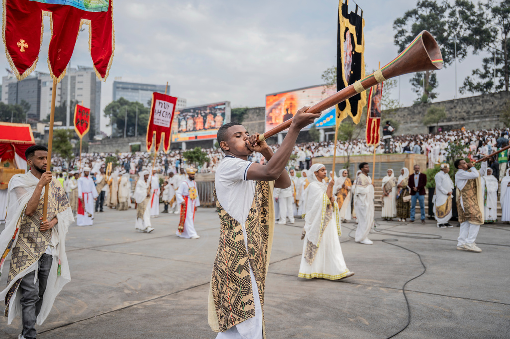 Members of an Orthodox choir perform during celebrations for the Orthodox holiday of Meskel, an annual holiday celebrating the discovery of the True Cross in the fourth century by the Roman Empress Helena, in Addis Ababa, Ethiopia, Saturday, Sept. 26, 2026. (AP Photo/Amanuel Sileshi)