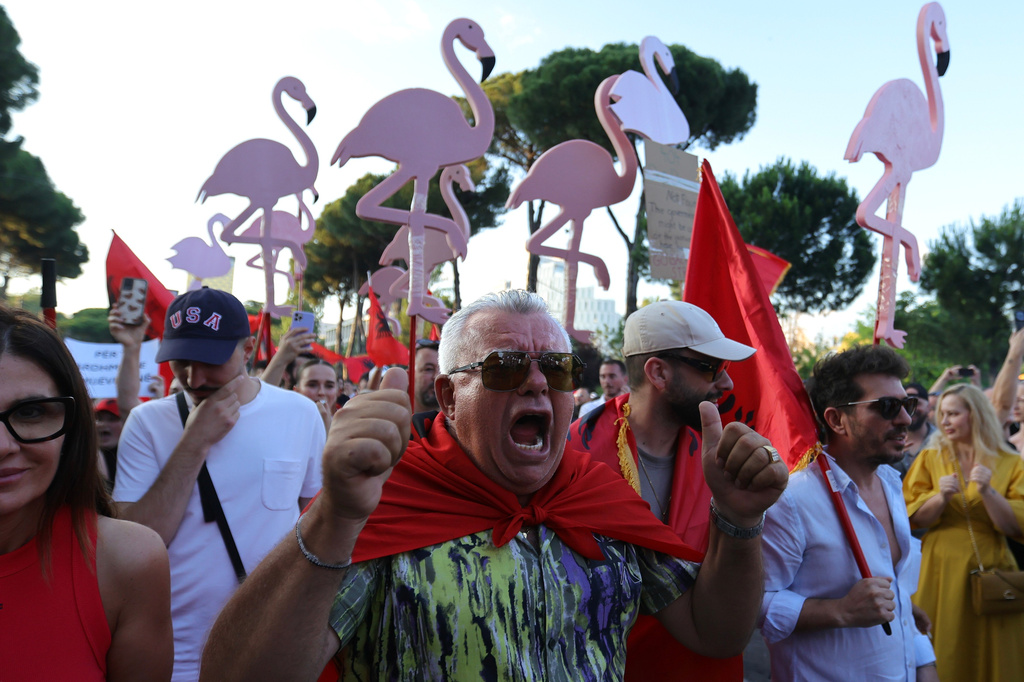Protesters take part in a rally in Tirana, Albania, on Saturday, June 20, 2026, against a coastal development project in western Albania linked to Donald Trump's son-in-law Jared Kushner. (AP Photo/Hameraldi Agolli)