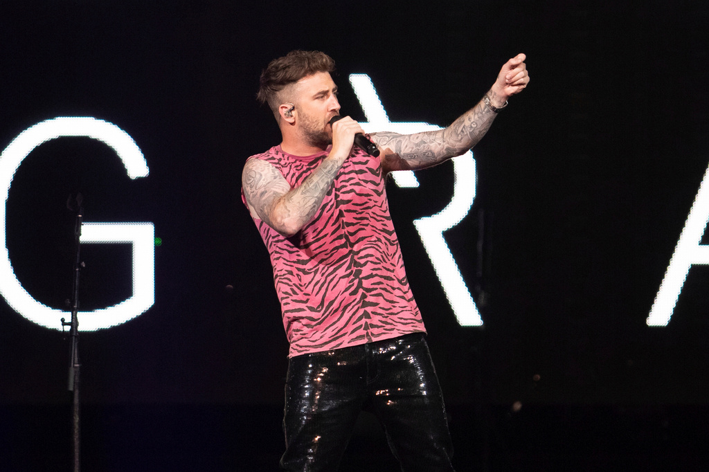 FILE - Singer Jordan McGraw performs on stage as an opening act for The Jonas Brothers "Happiness Begins" tour at the Capitol One Arena, Aug. 15, 2019, in Washington. (Photo by Brent N. Clarke/Invision/AP, File)