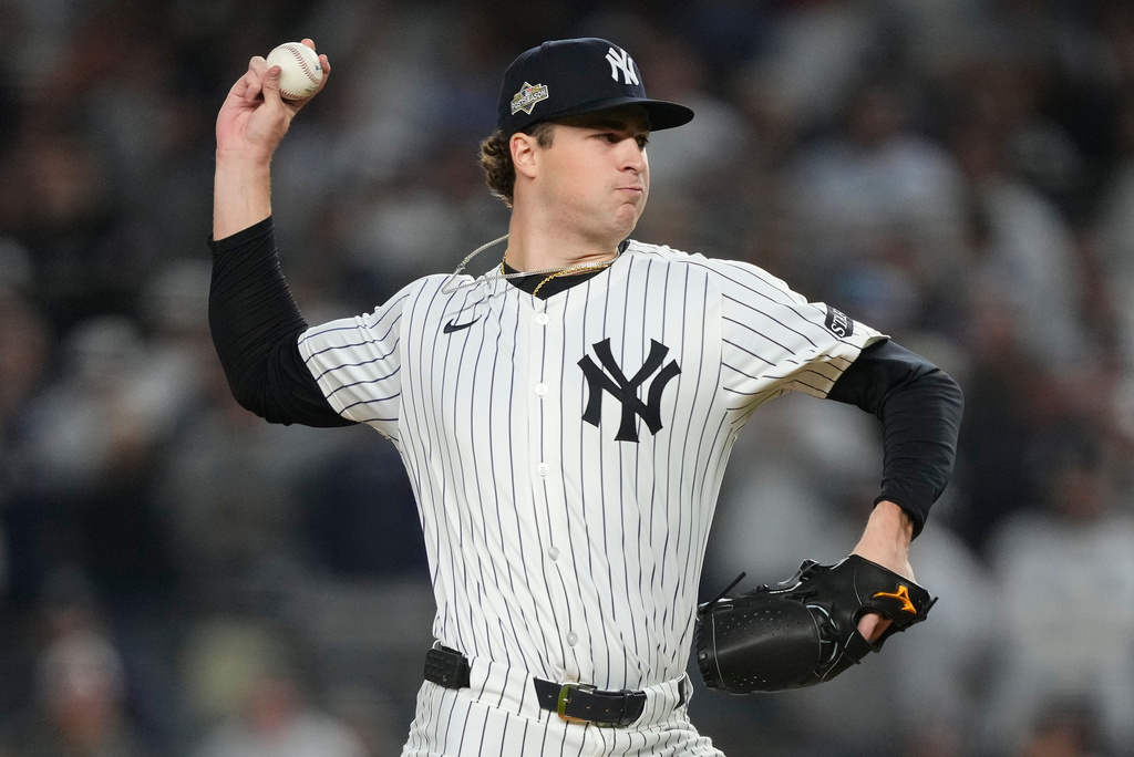 New York Yankees pitcher Cam Schlittler delivers against the Boston Red Sox during the first inning of Game 3 of an American League wild-card baseball playoff series, Thursday, Oct. 2, 2025, in New York. (AP Photo/Yuki Iwamura)