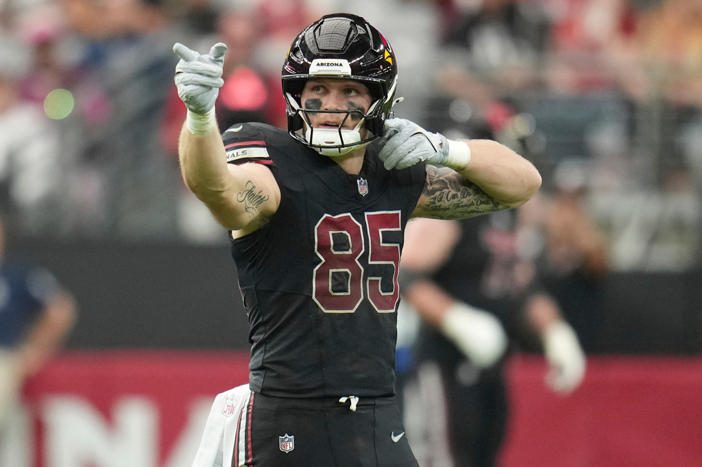 Arizona Cardinals tight end Trey McBride (85) celebrates a first down during the first half of an NFL football game against the Tennessee Titans, Sunday, Oct. 5, 2025, in Glendale, Ariz. (AP Photo/Rick Scuteri)
