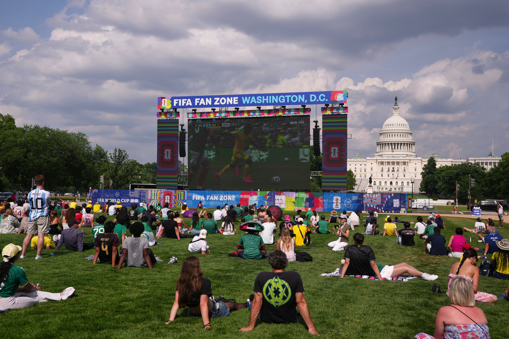 Fans watch the first match of the World Cup between Mexico and South Africa on the National Mall, Thursday, June 11, 2026, in Washington. (AP Photo/Allison Robbert)