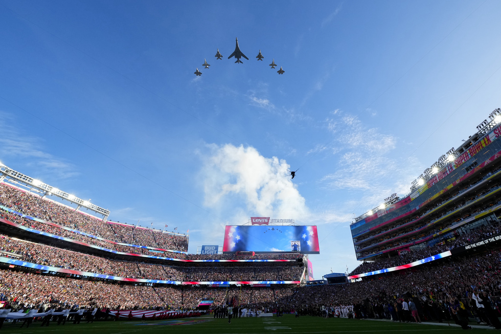 Planes fly in formation over Levi's Stadium before the NFL Super Bowl 60 football game between the New England Patriots and the Seattle Seahawks, Sunday, Feb. 8, 2026, in Santa Clara, Calif. (AP Photo/Julio Cortez)