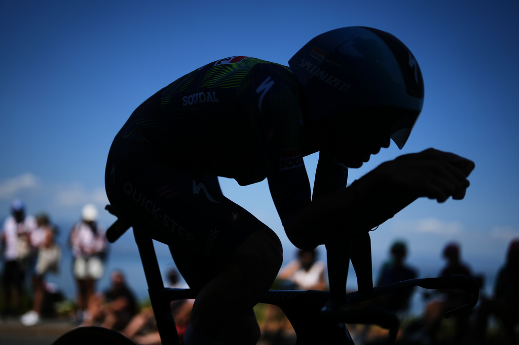 Netherland's Dylan Van Baarle rides during the sixteenth stage of the Tour de France cycling race, an indivdual time-trial with start in Evian-Les-Bains and finish in Thonon-les-Bains, France, Tuesday, July 21, 2026. (AP Photo/Thibault Camus)