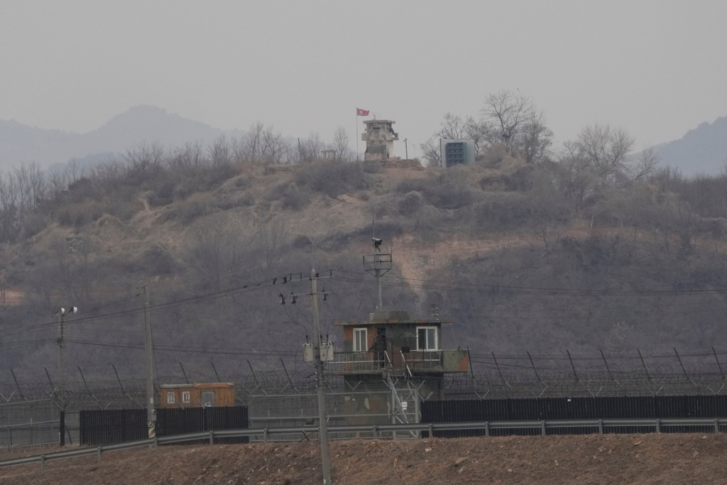 A North Korean military guard post, top, and a South Korean post, bottom, are seen from Paju, South Korea, near the border with North Korea, Thursday, Feb. 26, 2026. (AP Photo/Ahn Young-joon)