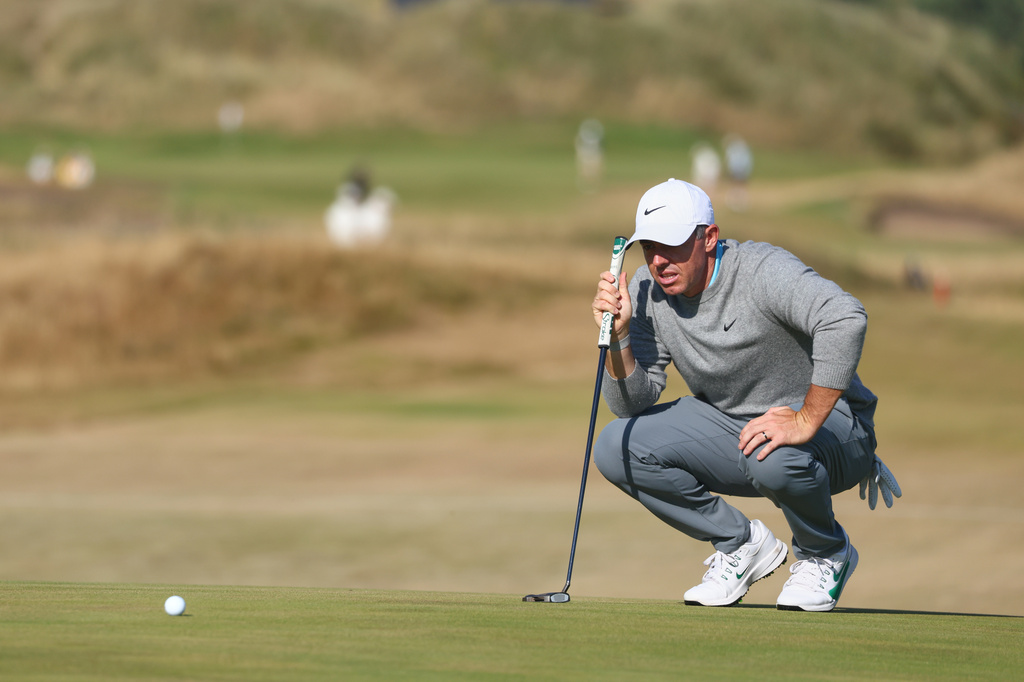 Rory McIlroy of Northern Ireland looks at the lie of his putt on the 8th green during a practice round for the British Open Golf championships at Royal Birkdale golf club, in Southport, England, Tuesday, July 14, 2026. (AP Photo/Peter Morrison)