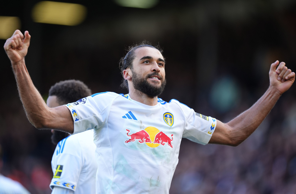 Leeds United's Dominic Calvert-Lewin celebrates after scoring their third goal of the game from the penalty spot during the English Premier League soccer match between Leeds United and Wolverhampton Wanderers, Saturday April 18, 2026, in Leeds, England. (Mike Egerton/PA via AP)