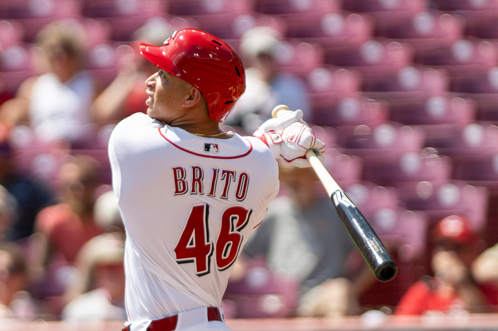 Cincinnati Reds second baseman Juan Brito (46) hits a thee-run home run in the second inning of a baseball game against the San Diego Padres, Wednesday, Sept. 2, 2026, in Cincinnati. (AP Photo/Tony Wagner)