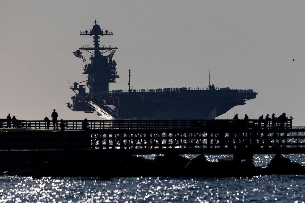 The USS Gerald R. Ford heads toward port at Naval Station Norfolk, as seen from Fort Monroe, Va., on May 16, 2026. (Peter Casey/The Virginian-Pilot via AP)