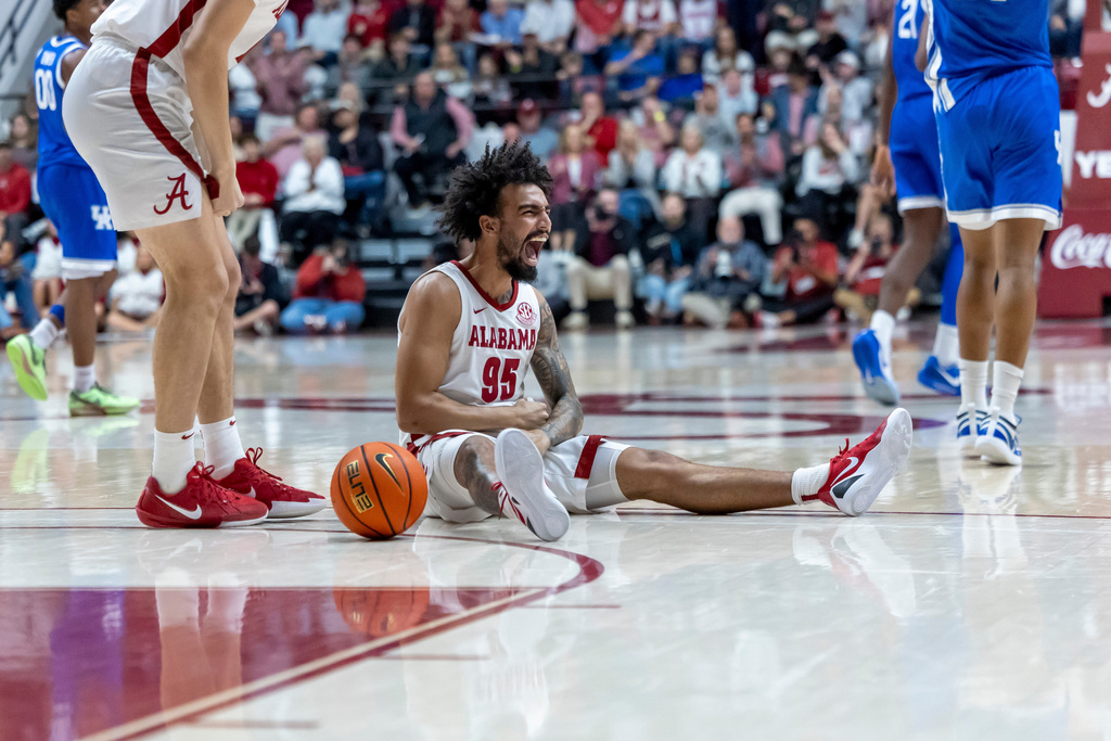Alabama guard Houston Mallette (95) celebrates drawing a foul against Kentucky during the first half of an NCAA college basketball game Saturday, Jan. 3, 2026, in Tuscaloosa, Ala. (AP Photo/Vasha Hunt)