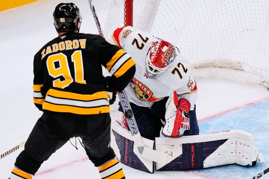 Florida Panthers goaltender Sergei Bobrovsky (72) makes a stick save on a shot by Boston Bruins defenseman Nikita Zadorov (91) during the second period of an NHL hockey game, Tuesday, Oct. 21, 2025, in Boston. (AP Photo/Charles Krupa)
