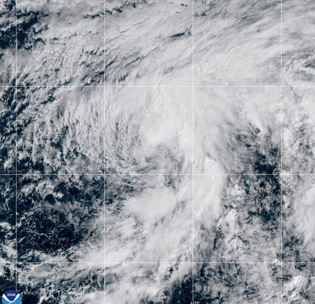 This satellite image provided by the National Oceanic and Atmospheric Administration shows tropical storm Douglas that formed Wednesday, July 1, 2026 in the Pacific Ocean. (NOAA via AP)