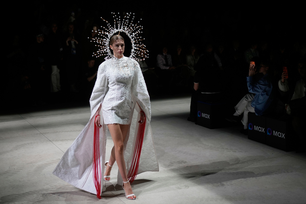 A model wears a creation by Russian brand Big Brooch on a runway at the Moscow Fashion Week in Moscow, Saturday, March 14, 2026. (AP Photo/Pavel Bednyakov)