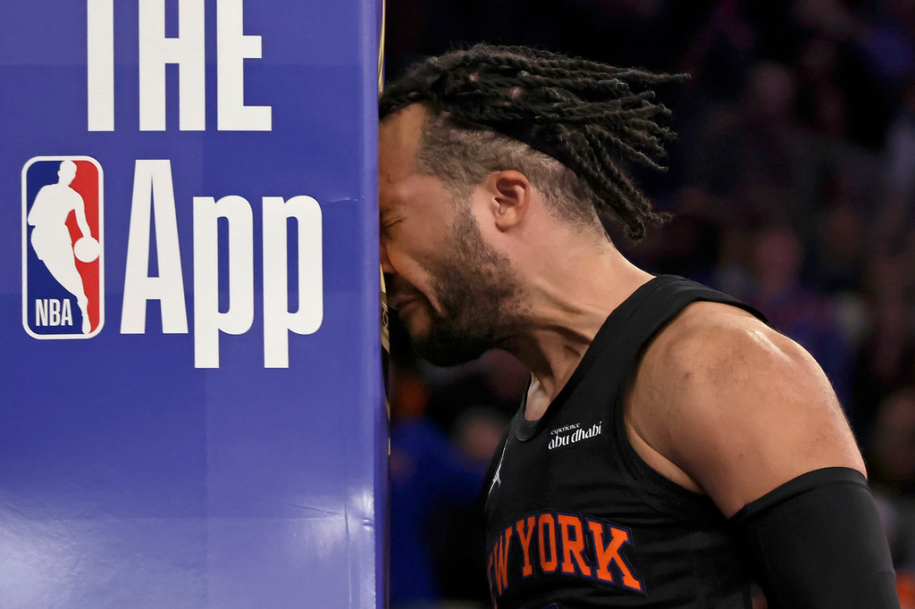 New York Knicks guard Jalen Brunson reacts after being fouled during the second half of an NBA Cup basketball game against the Milwaukee Bucks, Friday, Nov. 28, 2025, in New York. (AP Photo/Adam Hunger)