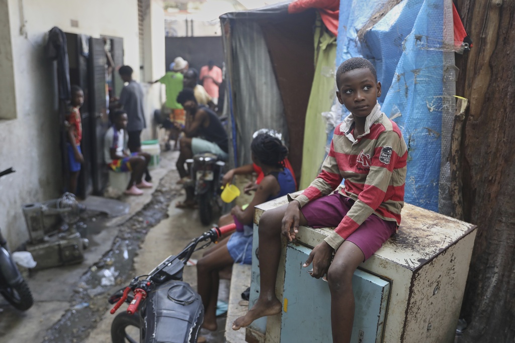 People displaced by gang violence live at the Ministry of Public Works, Transport and Communications office converted into a shelter in Port-au-Prince, Haiti, Tuesday, Sept. 9, 2025. (AP Photo/Odelyn Joseph)