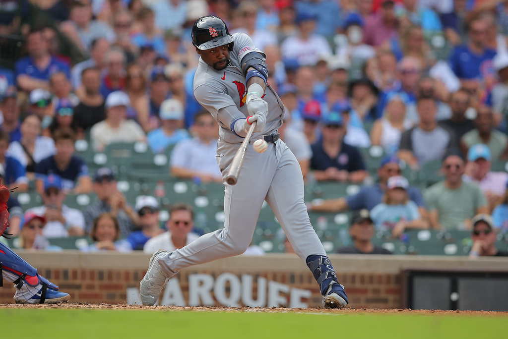 St. Louis Cardinals' Jordan Walker hits a two-run home run during the fourth inning of a baseball game against the Chicago Cubs, Sunday, Aug. 16, 2026, in Chicago. (AP Photo/Melissa Tamez)
