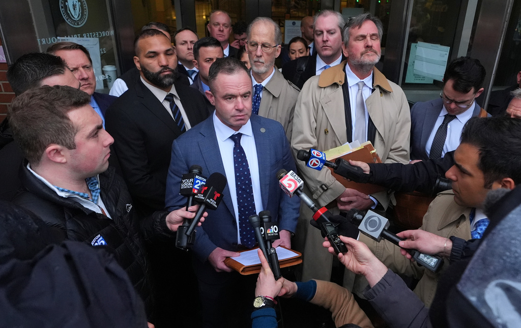 Brian Williams, President of the State Police Association of Massachusetts, addresses reporters outside Worcester County Superior Court following the arraignment of three State Police officers, Thursday, April 2, 2026, in Worcester, Mass. (AP Photo/Charles Krupa)