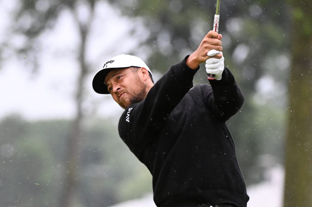 Xander Schauffele hits from the fifth tee during the final round of the Rocket Classic golf tournament, Sunday, Aug. 2, 2026, in Detroit. (AP Photo/Jose Juarez)